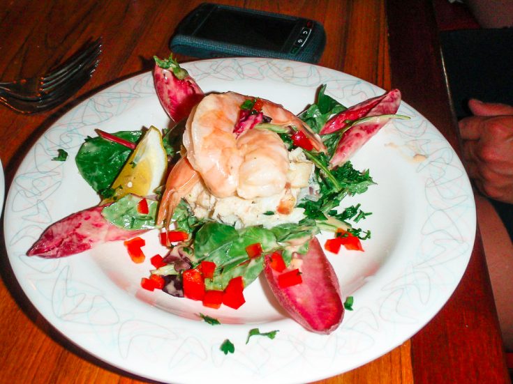 Aunt Annie's Seafood Salad on a white plate on the table